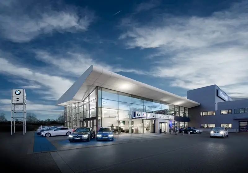 United Cars showroom and shop at sunset